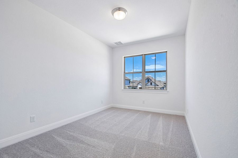 Spacious, unfurnished interior of a new home in 6 Creeks, Kyle (Image 23).