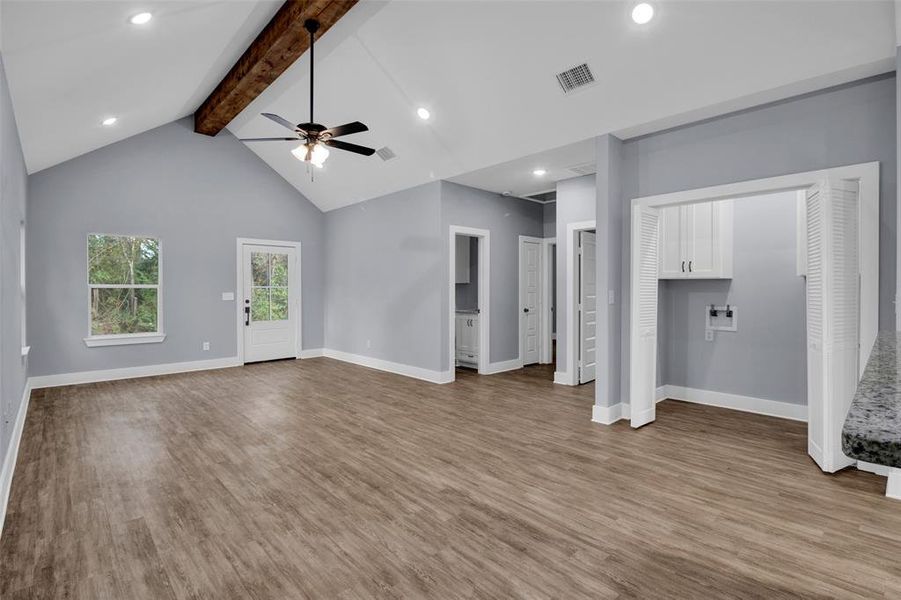Unfurnished living room with light wood-style flooring, recessed lighting, and a ceiling fan