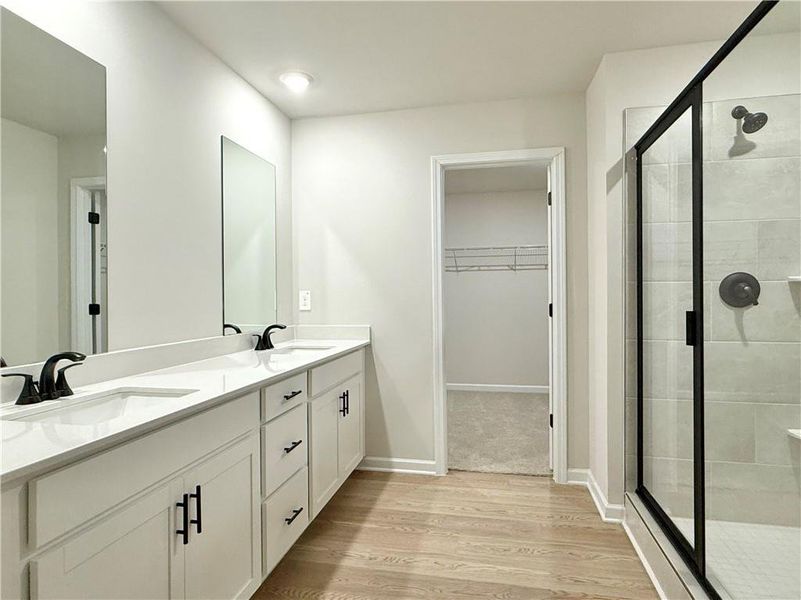 Furnished interior view inside a new home in Vines at Mill Creek - Estate Series, Braselton (Image 11).