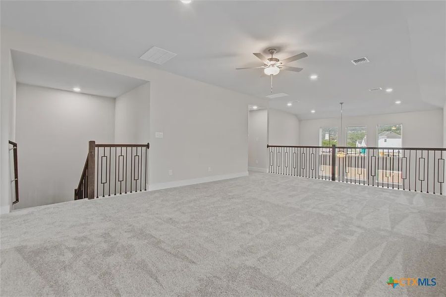 Spacious, unfurnished interior of a new home in Lakeside at Tessera on Lake Travis, Lago Vista (Image 23). Spacious, unfurnished interior of a new home in Lakeside at Tessera on Lake Travis, Lago Vista (Image 23).