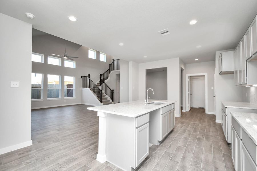 View from breakfast nook. Sample photo of completed home with similar floor plan. Actual colors and selections may vary.