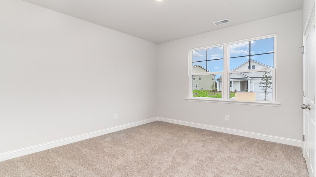 Representative unfurnished interior of a home built from the DARBY by D.R. Horton in Spring View Landing, Loris (Image 9).