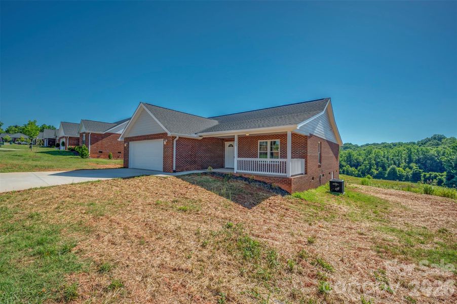 Exterior details and patio area of a home in , Spindale (Image 18).