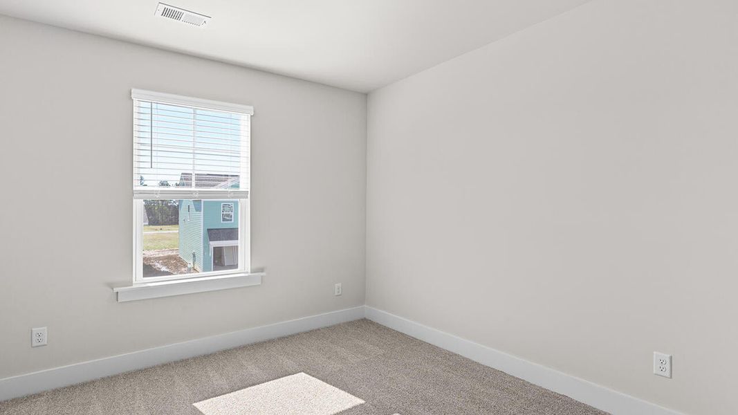 Spacious, unfurnished interior of a new home in Indigo Preserve, Leland (Image 34).