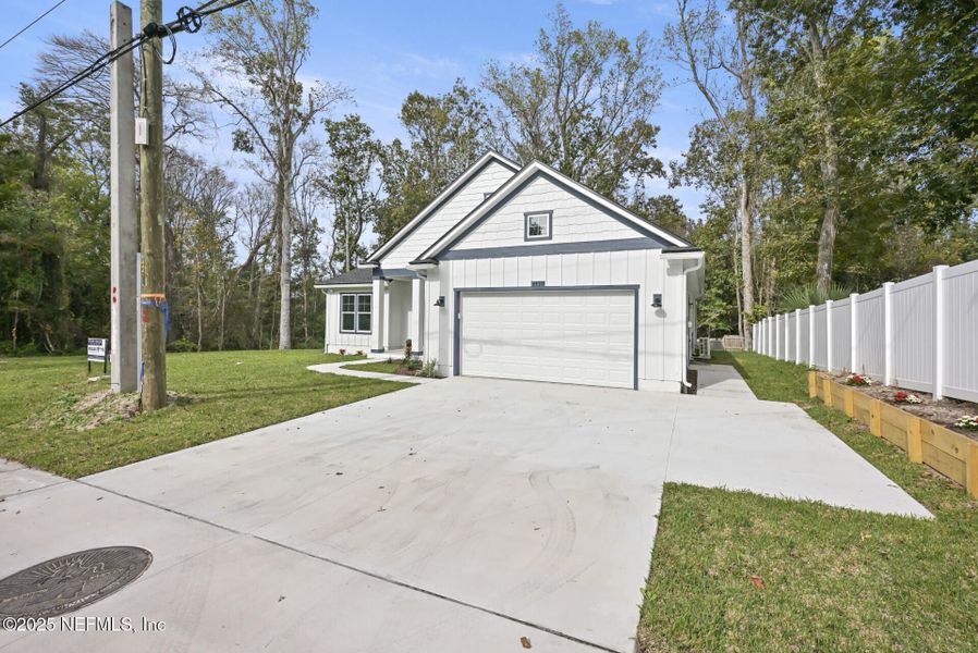 Front exterior of a new home in , Jacksonville, FL, highlighting curb appeal (Image 31).