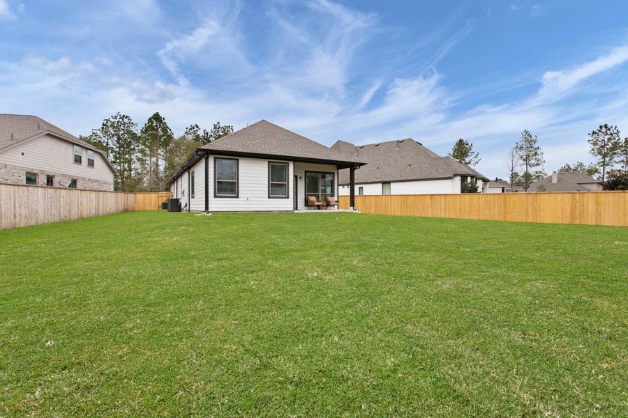 Exterior details and patio area of a home in Wood Leaf Reserve, Tomball (Image 4). Exterior details and patio area of a home in Wood Leaf Reserve, Tomball (Image 4).