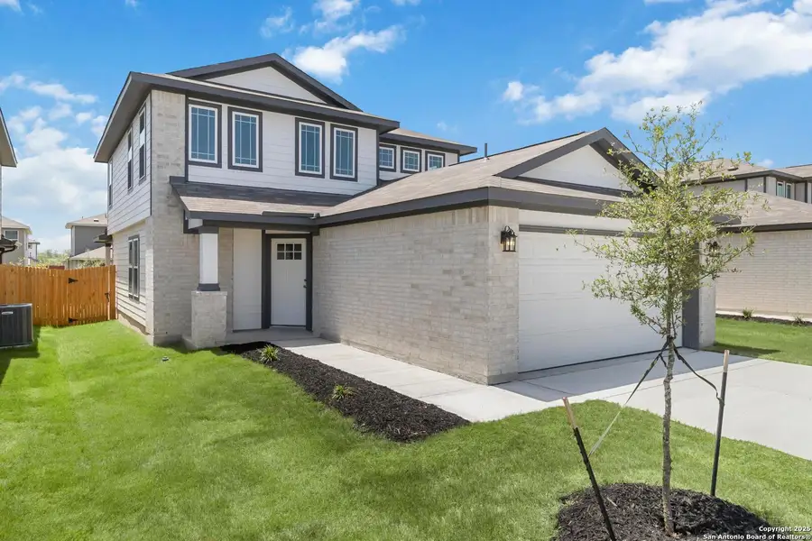 Front exterior of a new home in Willow Point, San Antonio, TX, highlighting curb appeal (Image 1). Front exterior of a new home in Willow Point, San Antonio, TX, highlighting curb appeal (Image 1).