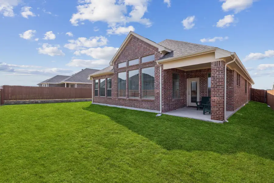 Representative exterior photo of a completed home built from the Morgan by Chesmar Homes in Heartland, Heartland, TX (Image 7).