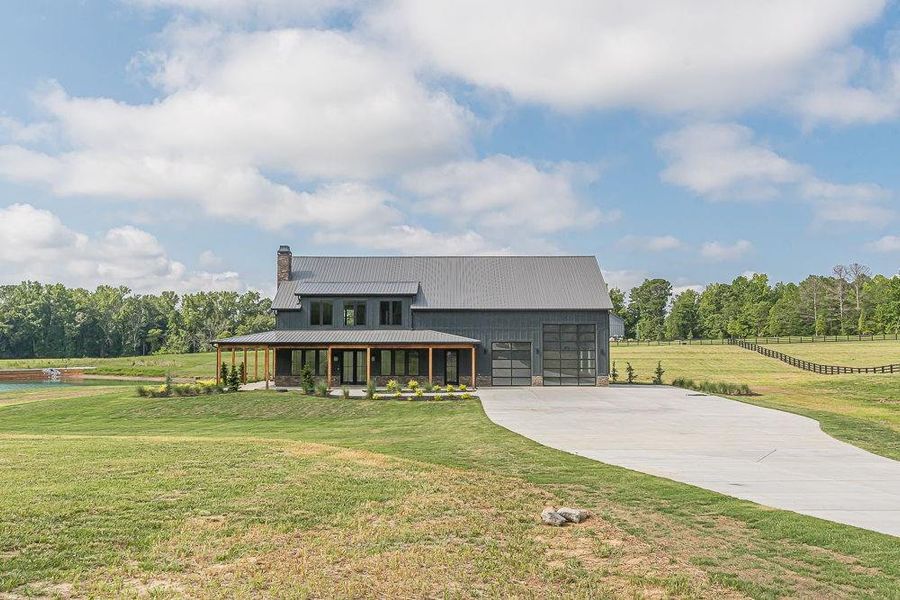 Front exterior of a new home in , Bremen, GA, highlighting curb appeal (Image 27). Front exterior of a new home in , Bremen, GA, highlighting curb appeal (Image 27).