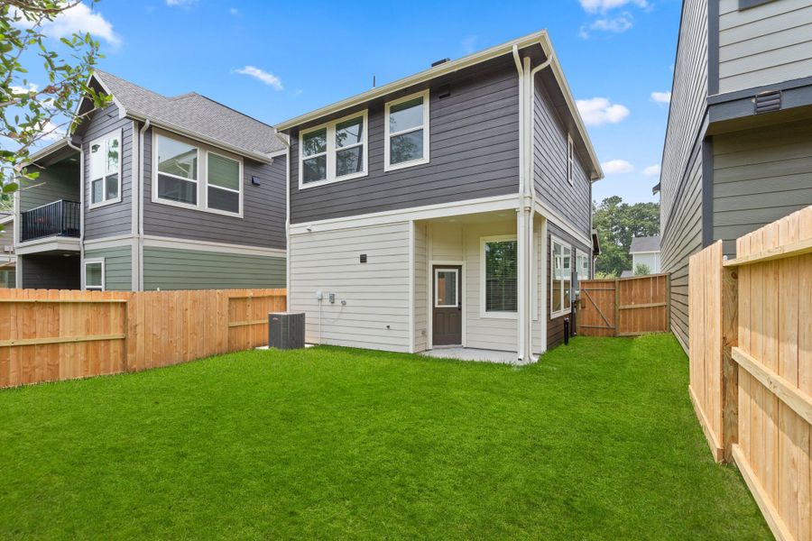 Exterior details and patio area of a home in The Woodlands Hills, Willis (Image 3). Exterior details and patio area of a home in The Woodlands Hills, Willis (Image 3).