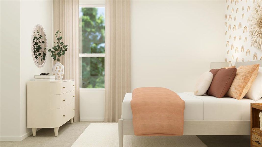 Bedroom featuring light colored carpet