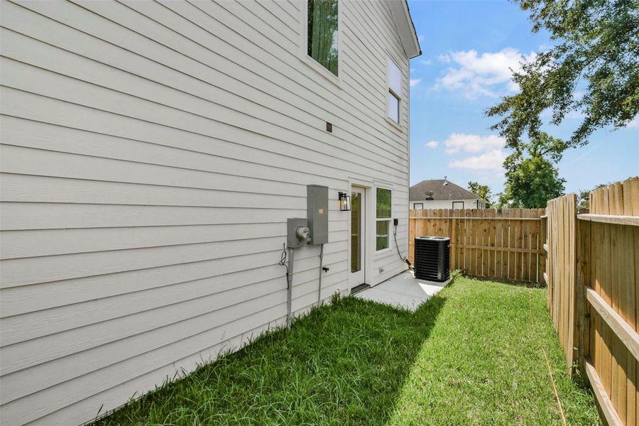 Exterior details and patio area of a home in , Houston (Image 3).