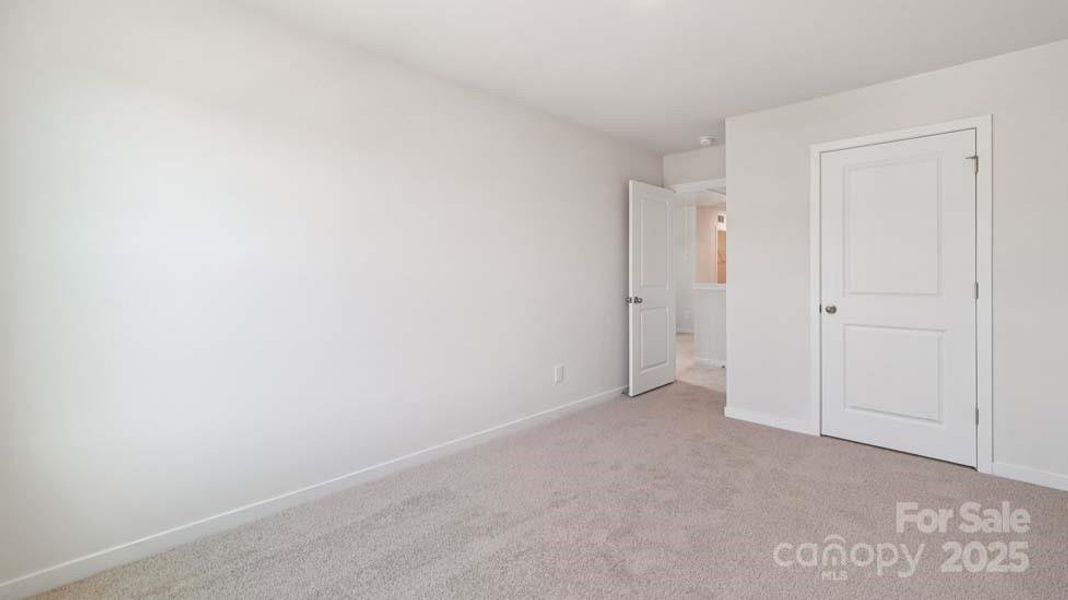 Spacious, unfurnished interior of a new home in Cardinal Creek, Charlotte (Image 18).