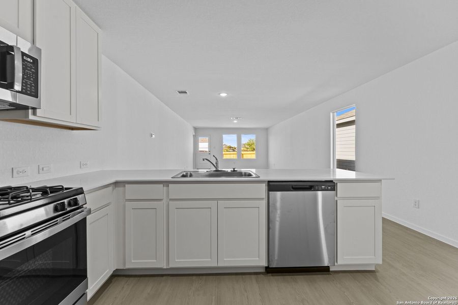 Furnished interior view inside a new home in , New Braunfels (Image 8).