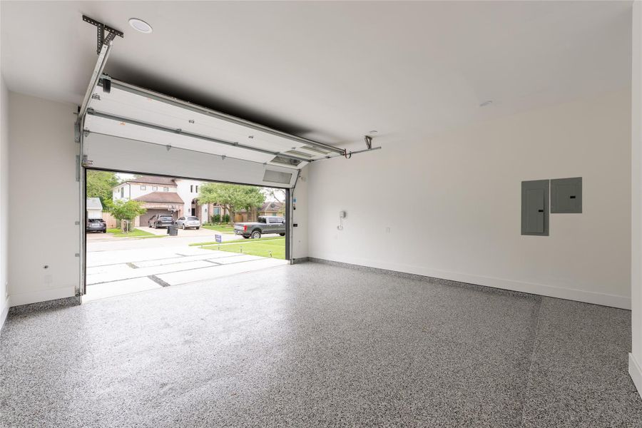 A spacious garage with room for parking and storage