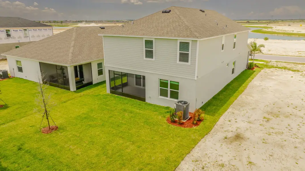 Exterior details and patio area of a home in Malabar Springs, Palm Bay (Image 4).