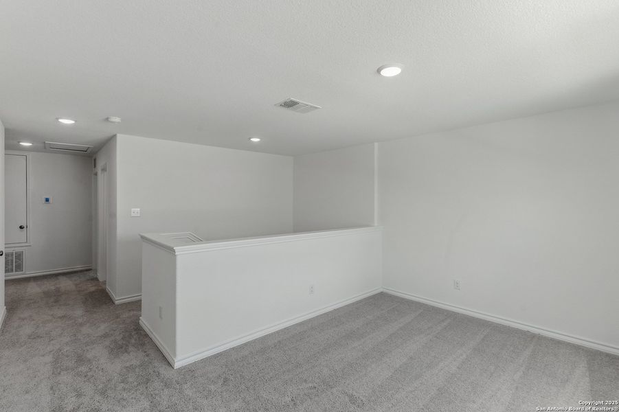 Spacious, unfurnished interior of a new home in Lily Springs, Seguin (Image 24). Spacious, unfurnished interior of a new home in Lily Springs, Seguin (Image 24).