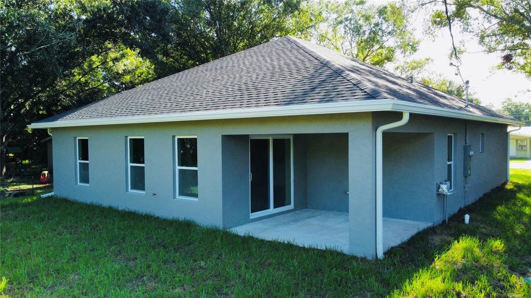 Front exterior of a new home in , Okeechobee, FL, highlighting curb appeal (Image 21).