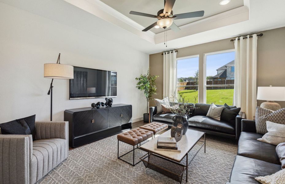 Large windows and tray ceiling in gathering room