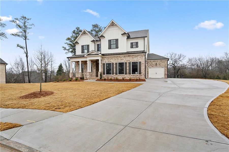 Front exterior of a new home in , Marietta, GA, highlighting curb appeal (Image 23).