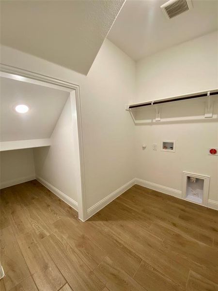 Separate laundry room is not a pass through and offers extra storage under the stairs Separate laundry room is not a pass through and offers extra storage under the stairs