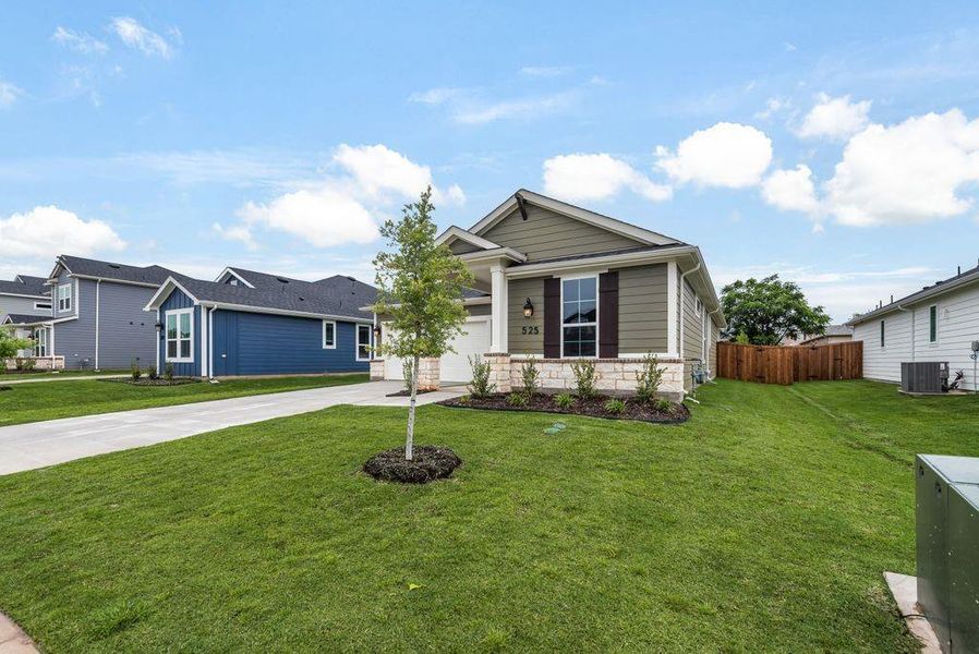 Front exterior of a new home in Creekside of Crowley, Crowley, TX, highlighting curb appeal (Image 21).
