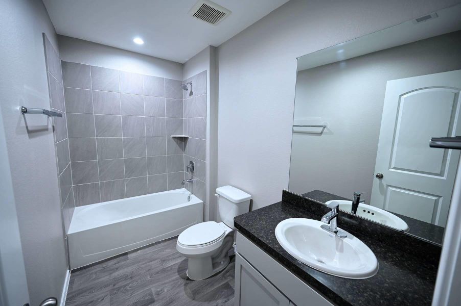 Furnished interior view inside a new home in Breckenridge Forest, Spring (Image 4).