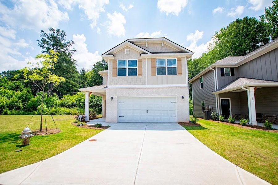 Front exterior of a new home in Windmill Park, Carrollton, GA, highlighting curb appeal (Image 27). Front exterior of a new home in Windmill Park, Carrollton, GA, highlighting curb appeal (Image 27).