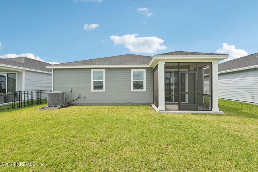 Exterior details and patio area of a home in Lakes at Bella Lago - Signature Series, Green Cove Springs (Image 22).