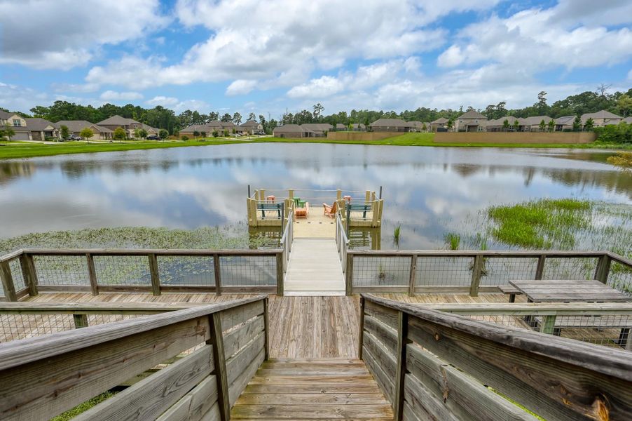 Enjoy tranquil lake views from the community fishing dock and waterfront gathering area, offering a relaxing setting for fishing, unwinding, and connecting with neighbors. Enjoy tranquil lake views from the community fishing dock and waterfront gathering area, offering a relaxing setting for fishing, unwinding, and connecting with neighbors.
