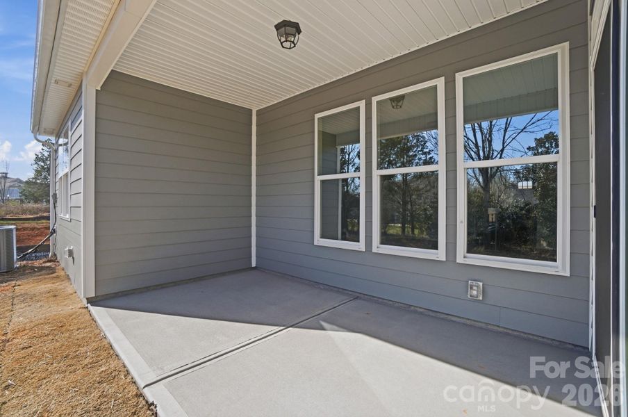 Exterior details and patio area of a home in Founders Landing | 55+ Community, Gastonia (Image 3).
