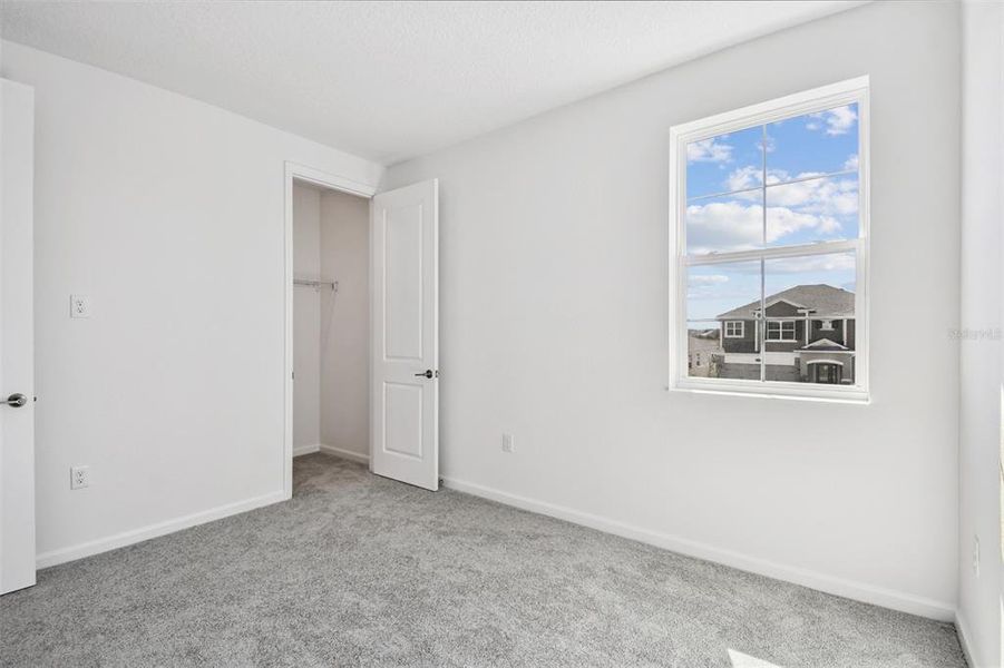 Spacious, unfurnished interior of a new home in Emerson Pointe, Apopka (Image 21).