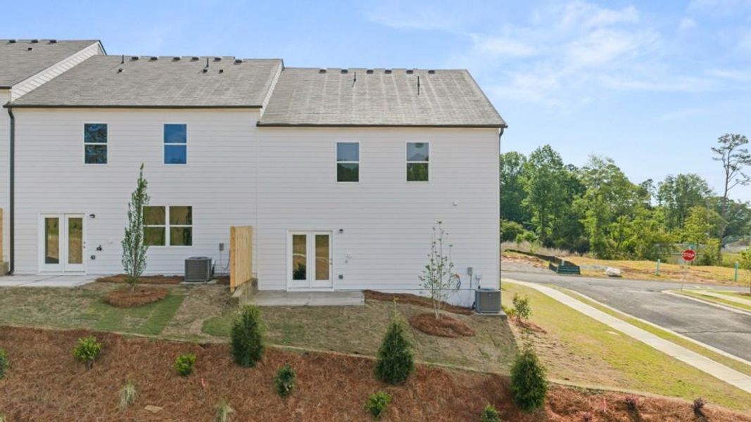 Exterior details and patio area of a home in Village at Pine Valley, Gainesville (Image 4).