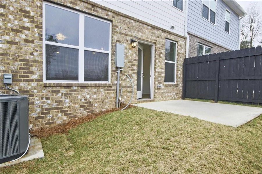 Exterior details and patio area of a home in Porter Reserve, Decatur (Image 18).