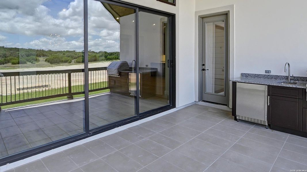 Exterior details and patio area of a home in George's Ranch, Boerne (Image 4).