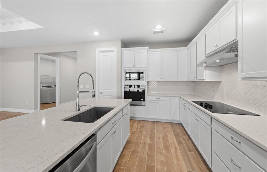 Furnished interior view inside a new home in The Strand at Cedar Grove, North Port (Image 9).