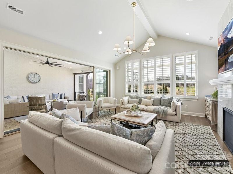 Great Room flows to the outdoor living and kitchen Great Room flows to the outdoor living and kitchen