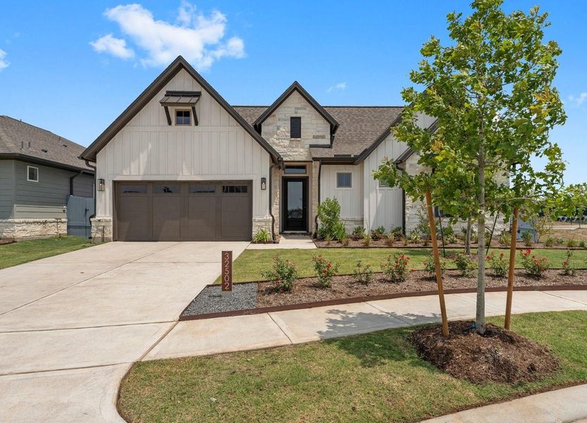 Front exterior of a new home in , Fulshear, TX, highlighting curb appeal (Image 22). Front exterior of a new home in , Fulshear, TX, highlighting curb appeal (Image 22).
