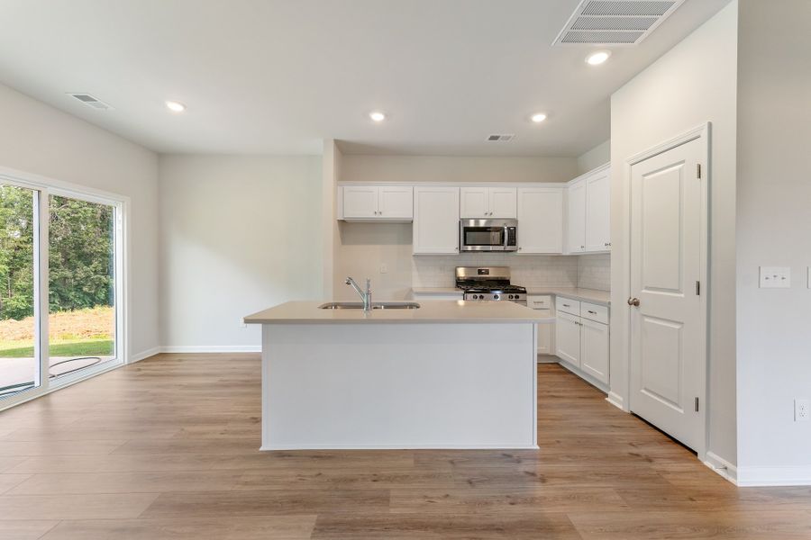 Furnished interior view inside a new home in Richmond Hill, Inman (Image 12).