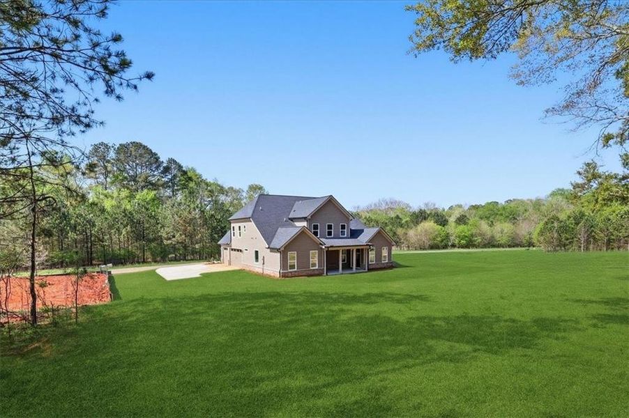 Exterior details and patio area of a home in , Hoschton (Image 36).