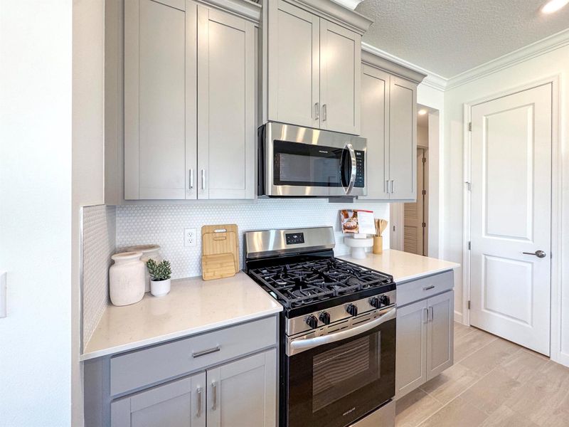 Furnished interior view inside a new home in Glynlea Country Club: The Augusta Collection, Port St. Lucie (Image 6).