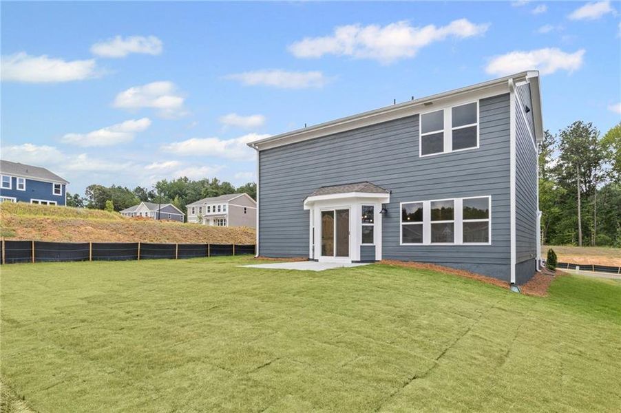 Front exterior of a new home in Sage Woods, Dallas, GA, highlighting curb appeal (Image 2).