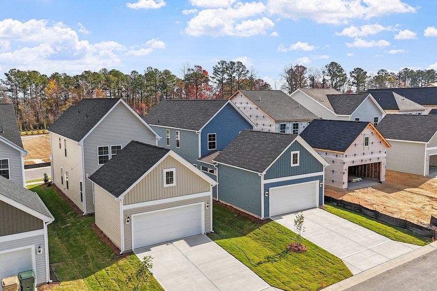 Front exterior of a new home in Renaissance at White Oak, Garner, NC, highlighting curb appeal (Image 17).
