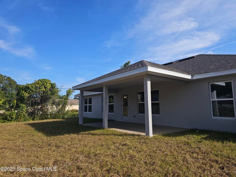 Exterior details and patio area of a home in Palm Bay, Palm Bay (Image 7). Exterior details and patio area of a home in Palm Bay, Palm Bay (Image 7).