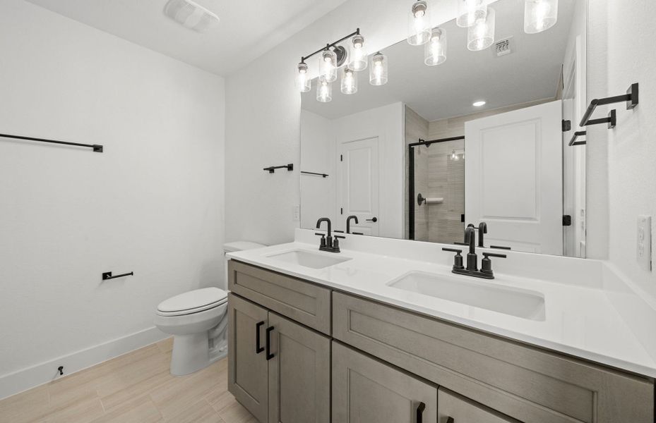 Furnished interior view inside a new home in Crosswinds, Kyle (Image 8).