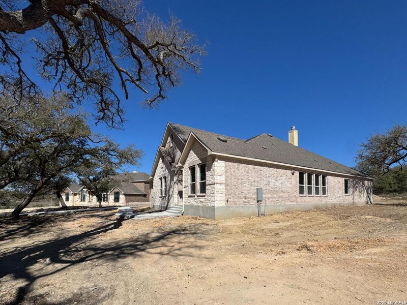Exterior details and patio area of a home in Waldsanger, New Braunfels (Image 2). Exterior details and patio area of a home in Waldsanger, New Braunfels (Image 2).