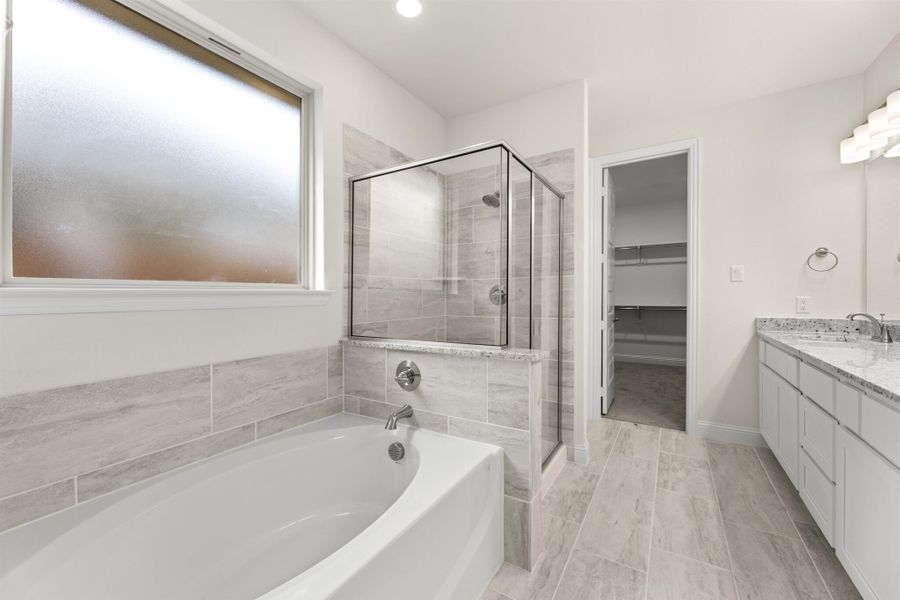 Representative furnished interior of a home built from the Juniper by UnionMain Homes in Edgewater, Fate (Image 11).