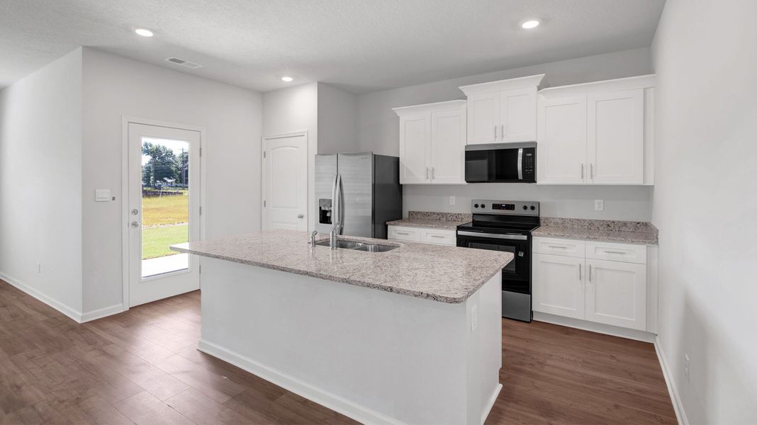 Furnished interior view inside a new home in Huntington Estates, Millington (Image 6).