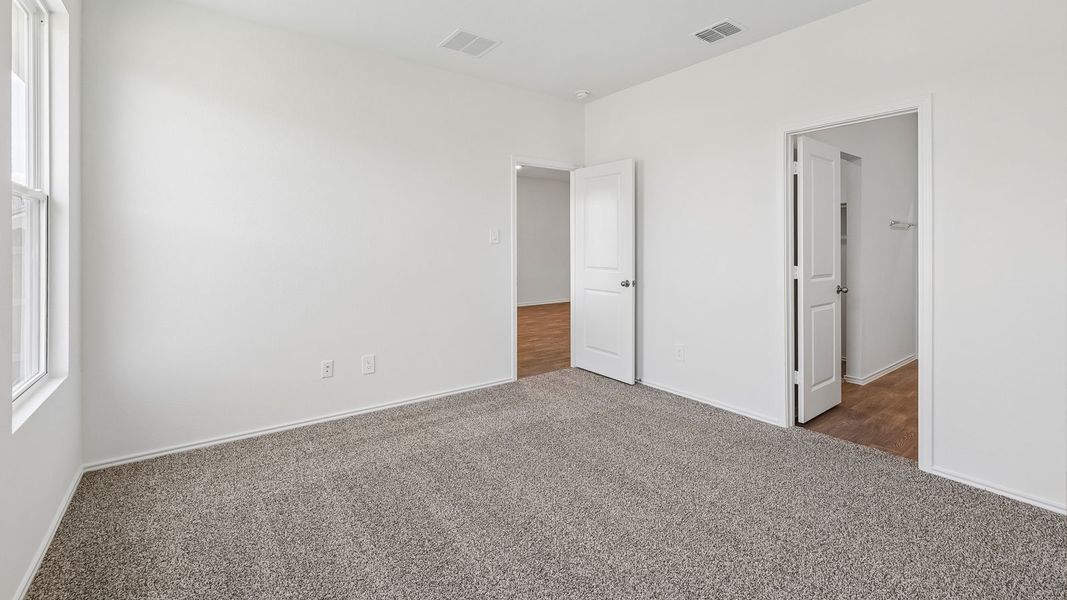 Spacious, unfurnished interior of a new home in Wayside, Uhland (Image 27).