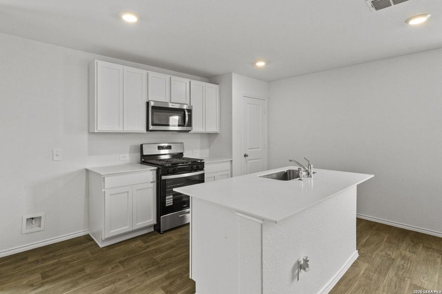 Furnished interior view inside a new home in Avenida, Converse (Image 6).